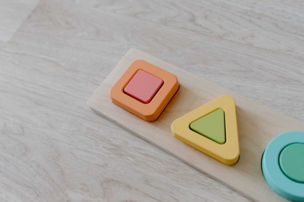 Close-up of a colorful wooden puzzle toy, ideal for sustainable learning.